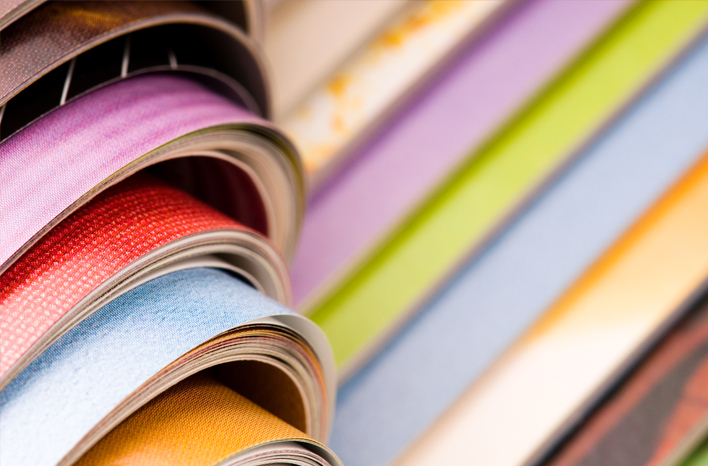 Canon | Publishing | Stapel kleurrijke tijdschriften | Hoe print de kranten- en tijdschriftenwereld revitaliseert